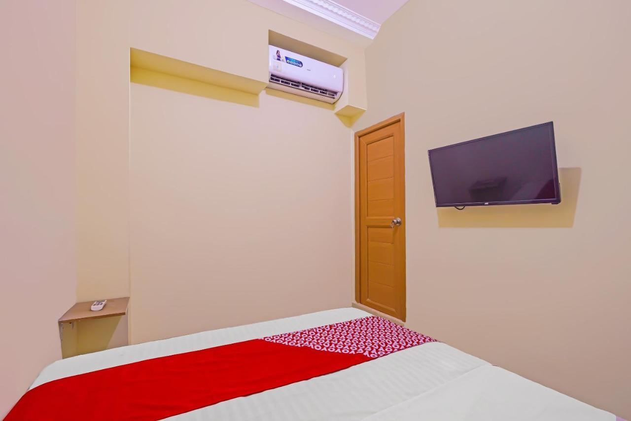 Oyo 92687 Alnindo Makaliwe Hotel 2*